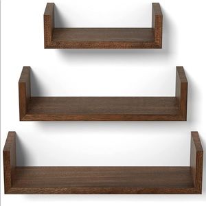 New set of 3 wood shelves never opened. Comes with hanging hardware.